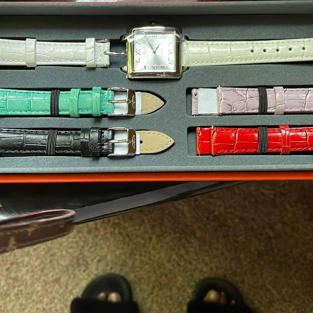 Invicta multiple colors bands and watch